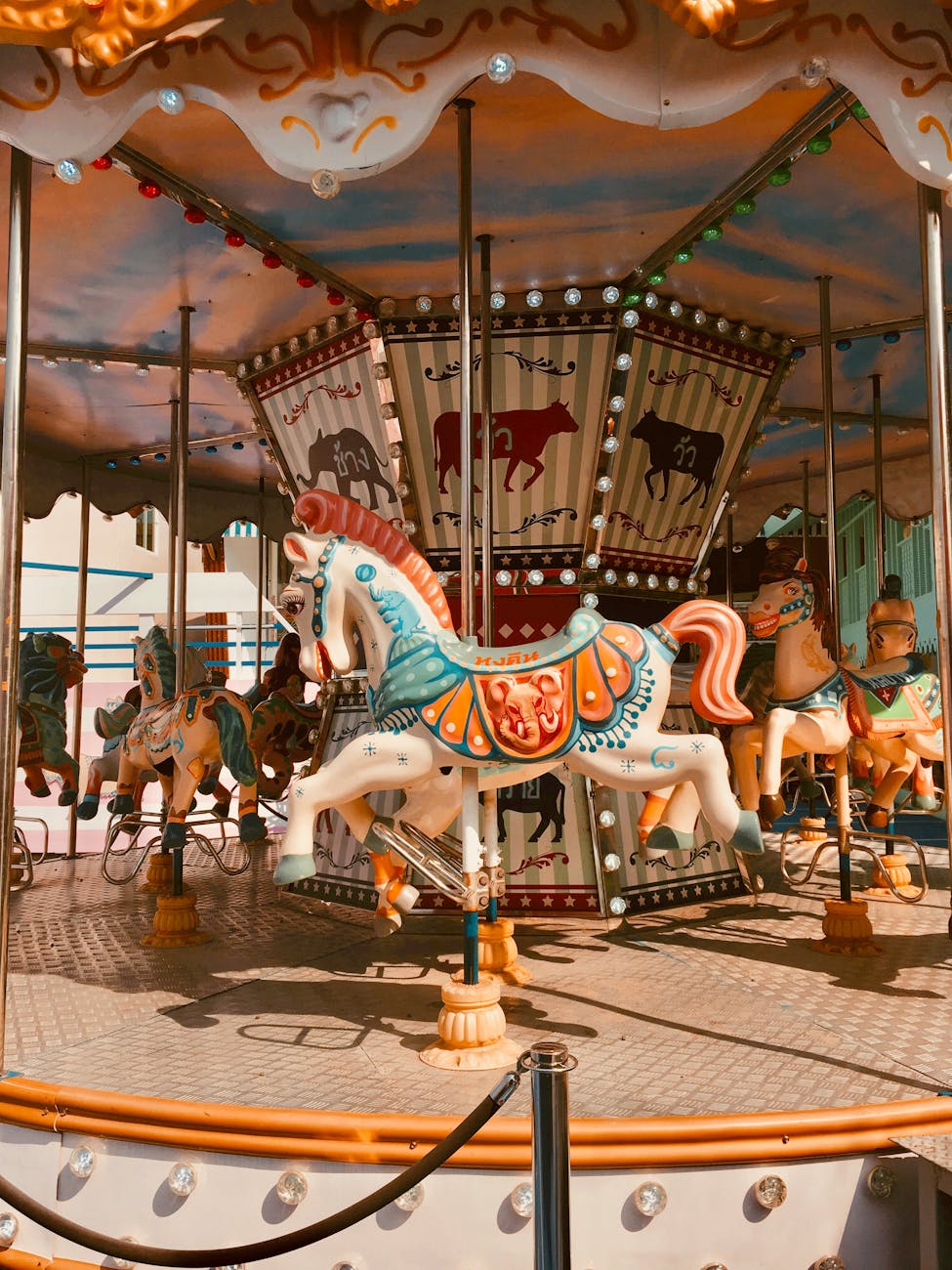 white and blue horse carousel